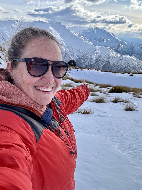 Me on the snowy mountains above Queenstown, flying with The Helicopter Line.